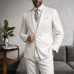 “Black three-piece tailored men’s suit with peak lapel”