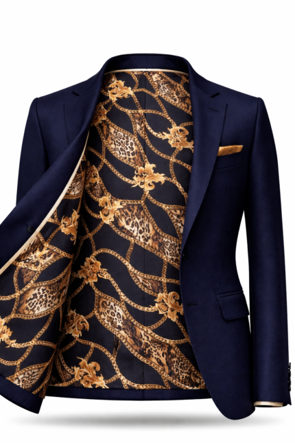 Men's navy blue suit jacket with luxury gold patterned inner lining and pocket square, premium tailored menswear.
