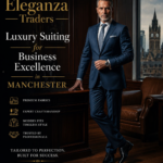 Professional man in a luxury tailored navy suit standing in an office in Manchester showcasing Eleganza Traders premium business suiting