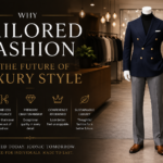 Luxury tailored fashion display featuring a premium navy blazer and tailored trousers in a modern boutique showroom